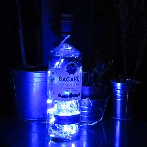 I was a bottle: Glas-Flaschen - Lampen und Leuchten, Laternen, Gläser, Vasen und Schalen aus Glas, Led- Flaschenlampen: große Bacardi Ledlampe mit blauem Licht