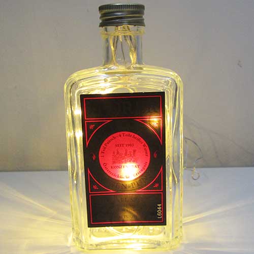 I was a bottle: Glas-Flaschen - Lampen und Leuchten, Laternen, Gläser, Led-Flaschenlampen: kleine Sporer Orangen-Punsch Flaschen-Lampe mit goldgelben Led-Licht