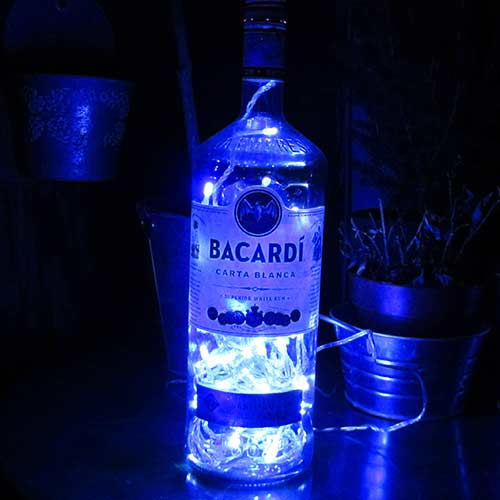 I was a bottle: Glas-Flaschen - Lampen und Leuchten, Laternen, Gläser, Vasen und Schalen aus Glas, Special Editions: große Bacardi Flasche, large mit blauem Ledlicht