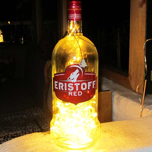 I was a bottle: Glas-Flaschen - Lampen und Leuchten, Laternen, Gläser, Vasen und Schalen aus Glas, Special Editions: große Outdoor Eristoff Maxi- Flasche mit gelben Ledlicht 